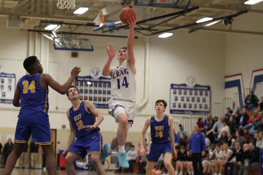 Craig Boys Basketball slips past Madison West 79-71