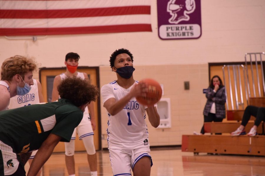 Da'Marcus DeValk shoots a free throw late in the game against Martin Luther.