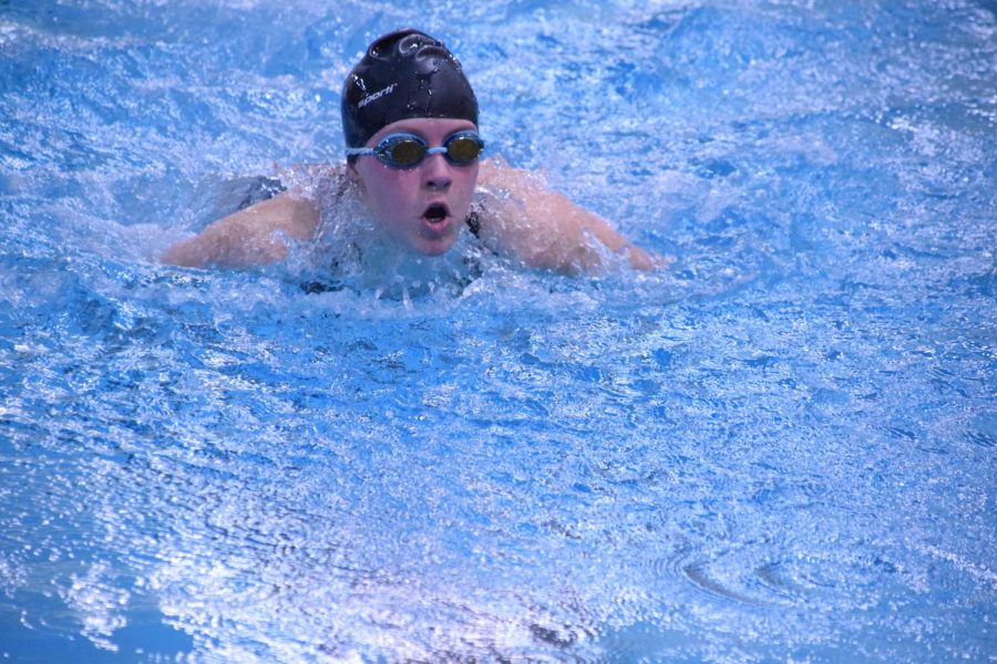 Freshman Savhanna Stecker takes a breath during the breaststroke leg of the 200 IM.