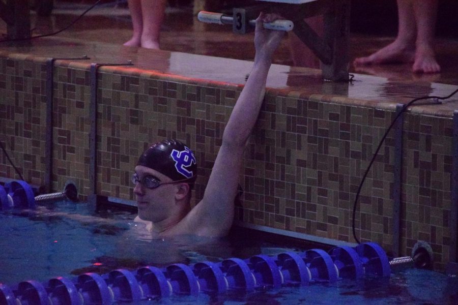 Ben+Witt+finishes+a+race.+He+will+compete+in+the+100+fly+and+200+free+at+the+WIAA+state+meet+on+Saturday%2C+Feb.+6%2C+at+Waukesha+South+High+School.