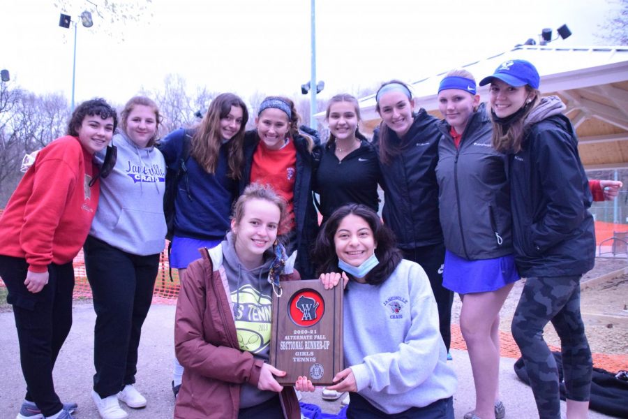 Craigs sectional team poses with their runner-up trophy on Wednesday, April 14, at Palmer Park. From left to right: In the front row (holding the plaque) are Lucia Hyzer and Myrka Ceballos. In the back row are Bridget Reilly, Hattie Plenty, Karyssa Norland, Becca Frank, Ellah Turenne, Allison Grund, Addison Kooyman, and Madison Burrow.