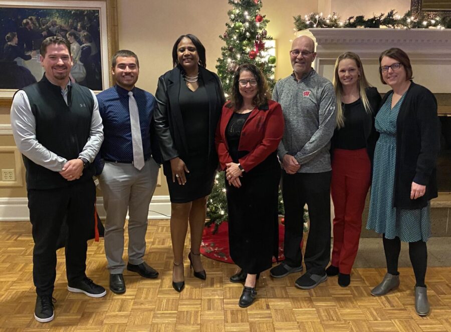 Janesville’s staff member of the year Stephanie Gates and teacher of the year Stefanie Hanson were joined by technology integrator Christine Pumilia (middle) and the Craig administrative team (Shawn Kane, Zach Gavin, Monte Phillips, and Dr. Alison Bjoin) for the Teacher of the Year dinner on Tuesday, Dec. 6, at the Janesville Country Club. 